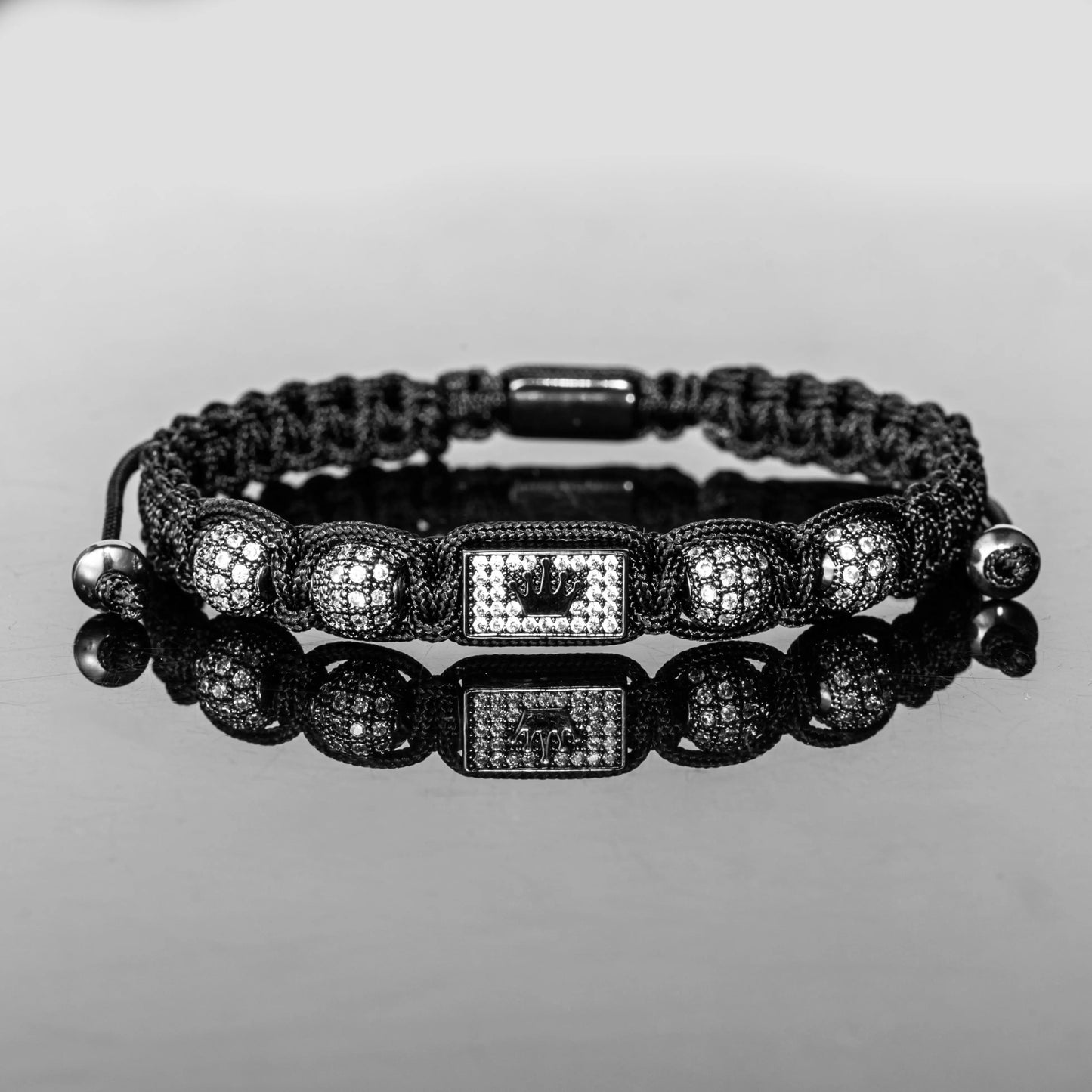 New Men's Adjustable Black Braided Crown Design Bracelet with Sparkling Synthetic Zirconia Stones Elegant GoldenTone Rectangular