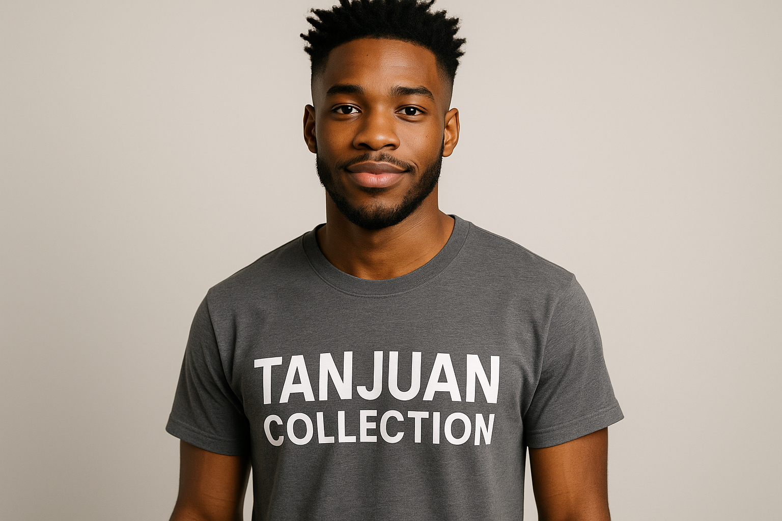 20's black male with "Tanjuan Collection" tee shirt on 
