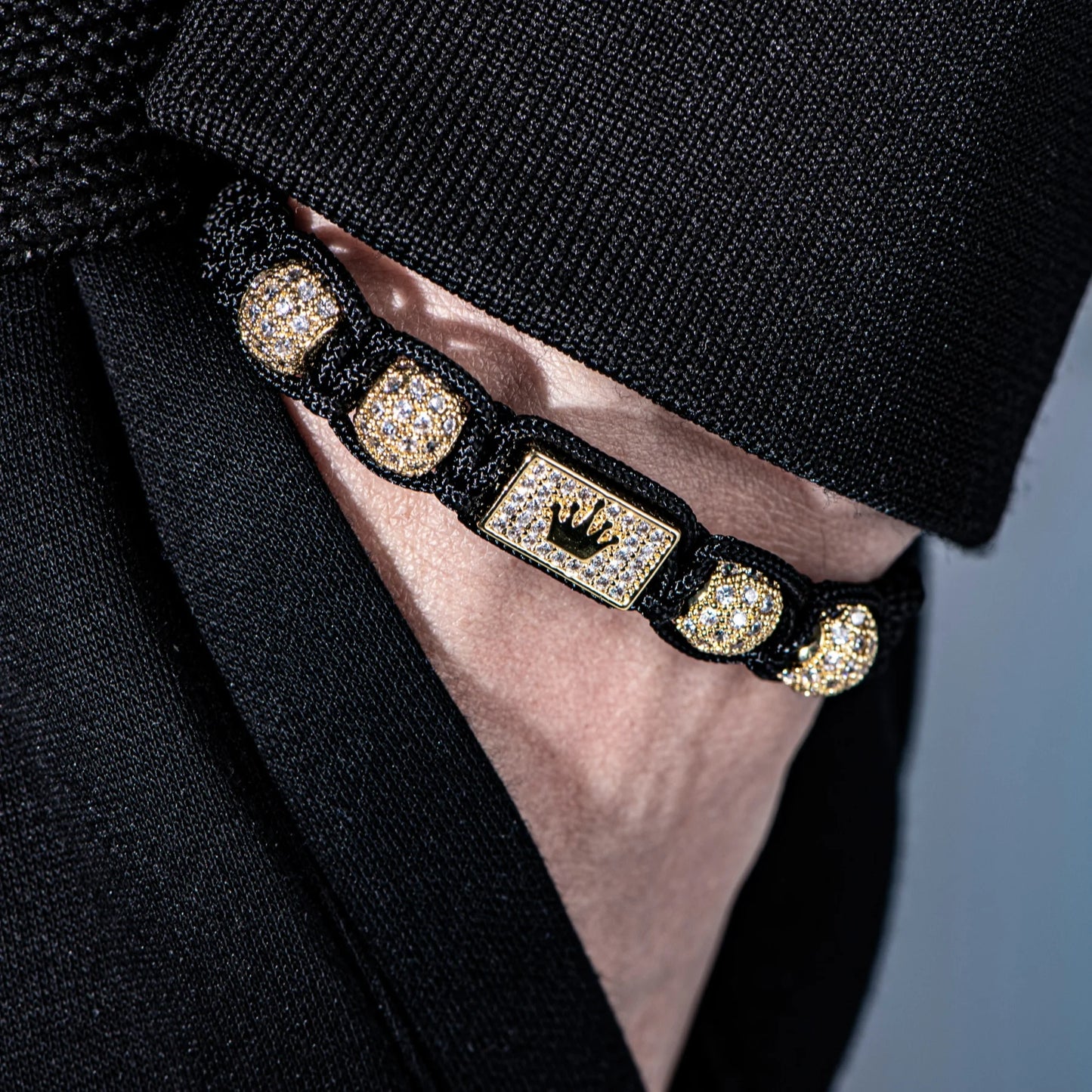 New Men's Adjustable Black Braided Crown Design Bracelet with Sparkling Synthetic Zirconia Stones Elegant GoldenTone Rectangular