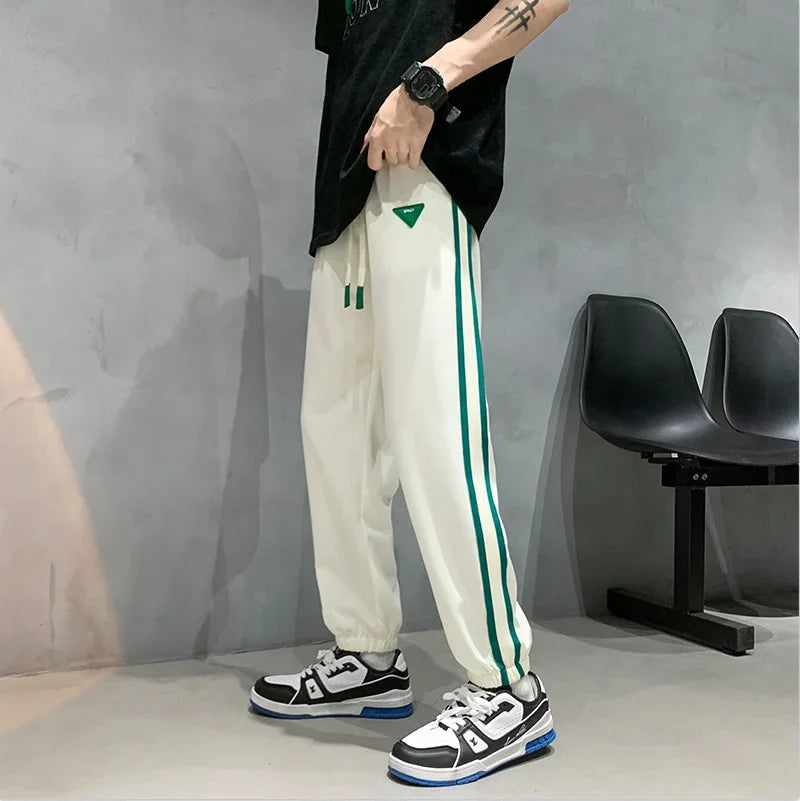 Joggers Streetwear Casual Side Stripe Pants Mens Fitness Sportswear Bottoms Loose Sweatpants Gyms Trousers Track pantalones