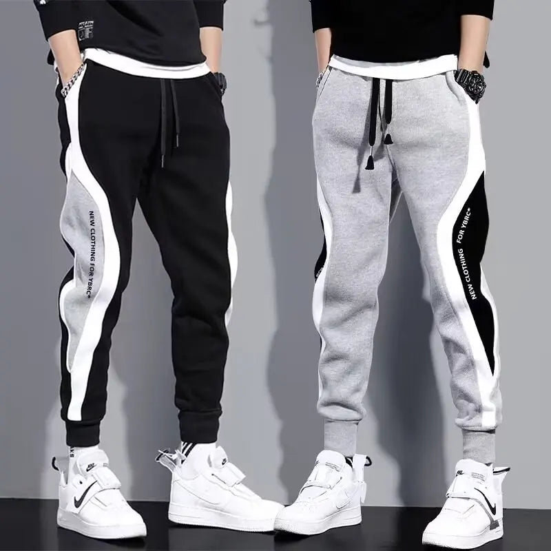 Jogging Suit Overview Style: Modern athletic fit — tailored but not tight, offering mobility and a clean silhouette. Material: Jacket and Pants: Premium moisture-wicking, breathable polyester blend with 10–20% spandex for