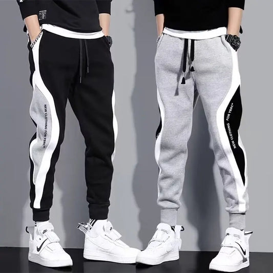 Jogging Suit Overview Style: Modern athletic fit — tailored but not tight, offering mobility and a clean silhouette. Material: Jacket and Pants: Premium moisture-wicking, breathable polyester blend with 10–20% spandex for