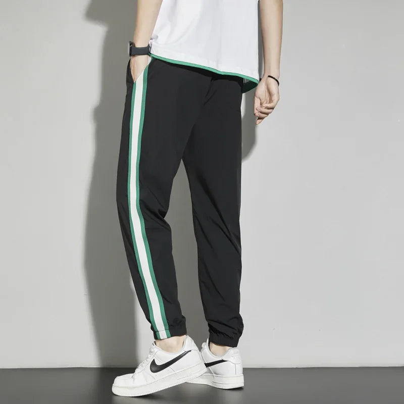 Joggers Streetwear Casual Side Stripe Pants Mens Fitness Sportswear Bottoms Loose Sweatpants Gyms Trousers Track pantalones