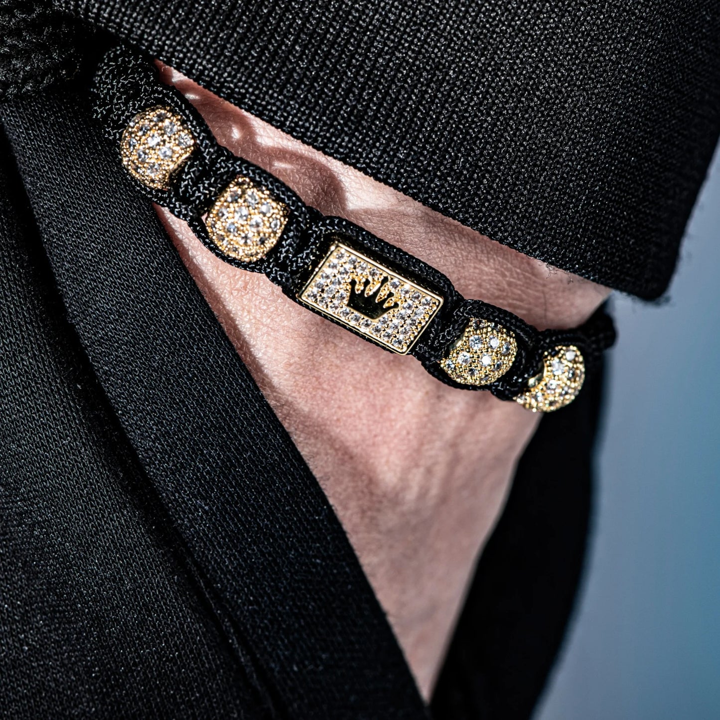 New Men's Adjustable Black Braided Crown Design Bracelet with Sparkling Synthetic Zirconia Stones Elegant GoldenTone Rectangular