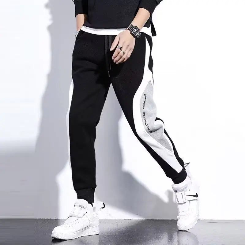 Jogging Suit Overview Style: Modern athletic fit — tailored but not tight, offering mobility and a clean silhouette. Material: Jacket and Pants: Premium moisture-wicking, breathable polyester blend with 10–20% spandex for