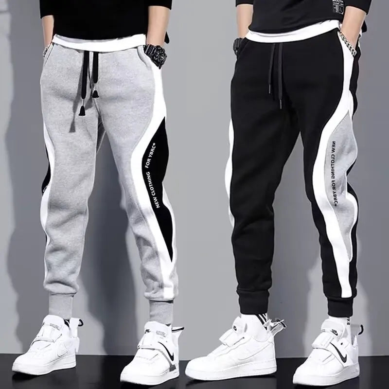 Jogging Suit Overview Style: Modern athletic fit — tailored but not tight, offering mobility and a clean silhouette. Material: Jacket and Pants: Premium moisture-wicking, breathable polyester blend with 10–20% spandex for