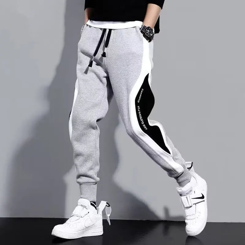 Jogging Suit Overview Style: Modern athletic fit — tailored but not tight, offering mobility and a clean silhouette. Material: Jacket and Pants: Premium moisture-wicking, breathable polyester blend with 10–20% spandex for