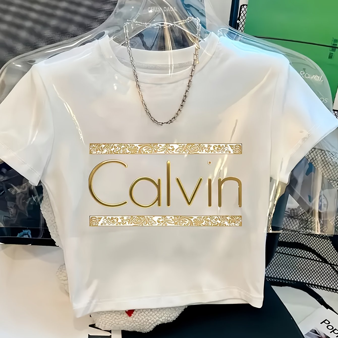 [Y2K Style Calvin Tee] Calvin Graphic Print Short Sleeve T-Shirt | Y2K Style, Spring/Summer White Tee with Golden Details, Casual & Stylish, Youthful Fashion | Comfortable Fit, Ladies T Shirts, Bold Lettering Top