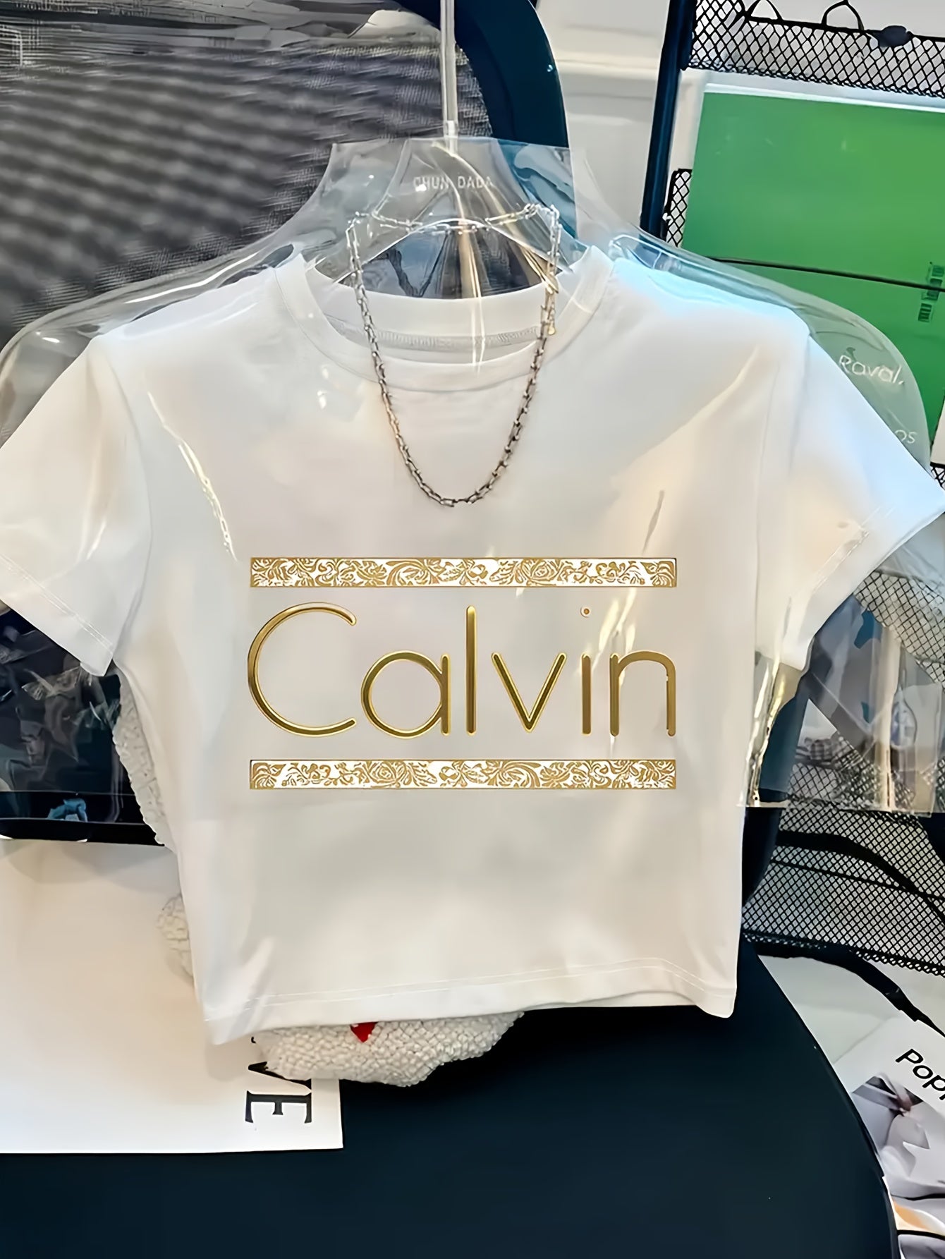 [Y2K Style Calvin Tee] Calvin Graphic Print Short Sleeve T-Shirt | Y2K Style, Spring/Summer White Tee with Golden Details, Casual & Stylish, Youthful Fashion | Comfortable Fit, Ladies T Shirts, Bold Lettering Top